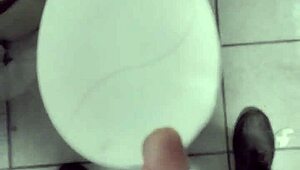 Masturbating alone at work in a solo session.