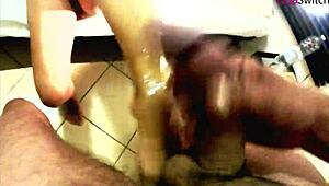 A casual amateur session where the mistress kicks balls and gets cum on her feet.