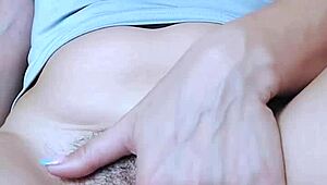 A teen girl fingers her hairy pussy to a shaking orgasm.