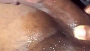 Jerking off big black cock in car under moonlight