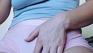 A teen girl fingers her hairy pussy to a shaking orgasm.