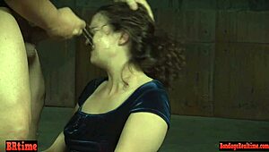 Submissive lover gets her throat slammed hard by dominant cock in rough group play. Toys add to the intense domination.