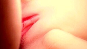 Pink color smooth vagina close-up