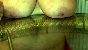 huge 34jj granny boobs bounced as she reached wild orgasm. her chubby frame shook with pleasure.