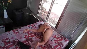 hidden camera catches the latina rocker stepdaughter masturbating her big ass in her room