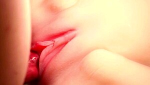 Pink color smooth vagina close-up