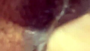 playing with my dildo and reaching climax on it