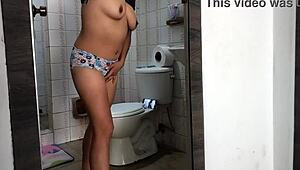 Boss's stepdaughter undresses in bathroom!