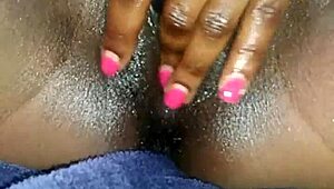 Black Ebony Woman Masturbates in Close-Up