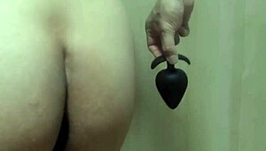 Japanese Girl in Swimsuit Forced to Take Huge Anal Plug