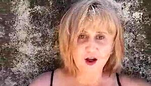 Blonde Milf Exposes Huge Tits!