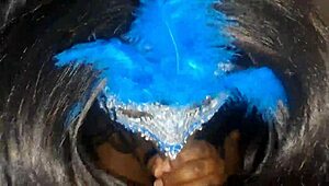 masked ebony receives a facial treatment