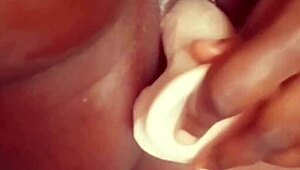 Ebony amateur's solo masturbation with dildo goes viral online.