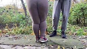 Depraved curvy milf squats in leggings to piss outdoors!