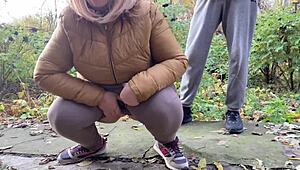 Depraved curvy milf squats in leggings to piss outdoors!