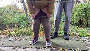Depraved curvy milf squats in leggings to piss outdoors!