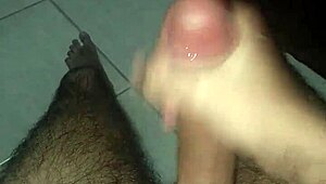 this brazilian guy is masturbating his monster cock and cumming so hard 😩
