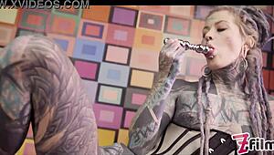 Tattooed Alternative Pornstar Anuskatzz in Corset Plays with Metal Toy