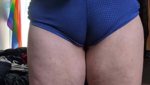 trying on clothes, teasing camera with and without packer