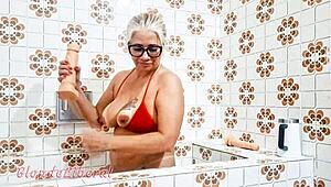 latina milf slut puts dildo in pussy and pisses in bathroom, sensual solo masturbation trailer.