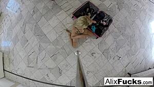 Creeper hidden camera catches Alix dressing with big tits on display.