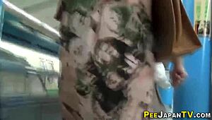 I swear, I caught these asians peein’ on hidden cam outdoors!