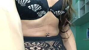 Izabela, the shemale goddess, shows off her big tits and monster cock in lingerie