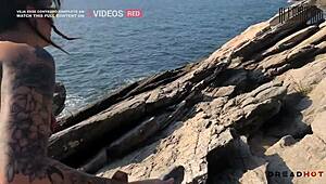 Woman Shows Breasts On Beach And Leads To Rocks For Fun