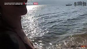 Woman Shows Breasts On Beach And Leads To Rocks For Fun