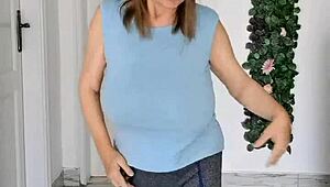 Busty gilf MariaOlds strips with sporty dance moves.