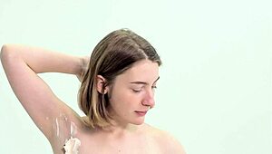 Sweet teen carefully shaves herself in a relaxing routine