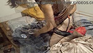 clothed in black satin dress and panties