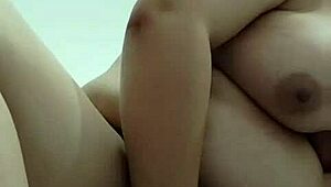 Vietnamese Babe Stuffs Bottle in Shaved Pussy for Wild Play