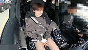 Uncensored 19-year-old Japanese beauty masturbates in car and bangs outside