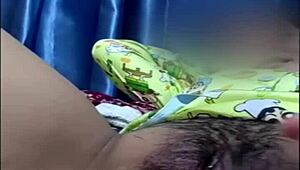 My beautiful wife enjoys wet pussy play with her girlfriend during a steamy video call sex session.