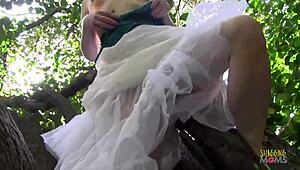 Blonde Climbs Tree For Solo Masturbation!