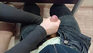 Bold handjob grips classmate's cock during intense lecture