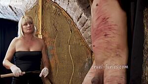 Cruel Blonde MILF Whips Guy's Cock In Femdom