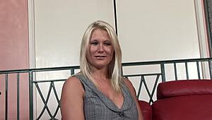 Blondie with round huge boobs licks her tits to seduce you