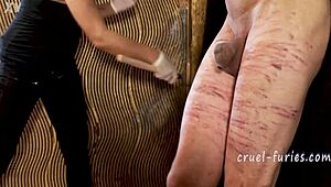 Cruel Blonde MILF Whips Guy's Cock In Femdom