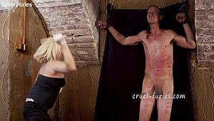 Cruel Blonde MILF Whips Guy's Cock In Femdom
