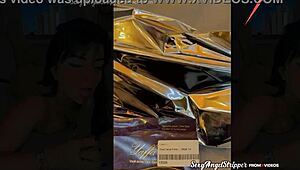 Trying on sexy outfits in a public store fitting room with a hot latina