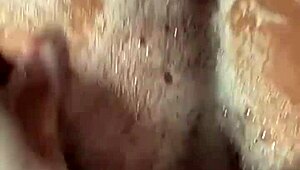 Brunette's pussy fucked in bubble bath