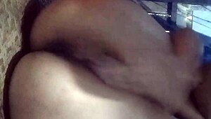 A girl practices yoga before showering in this homemade video.