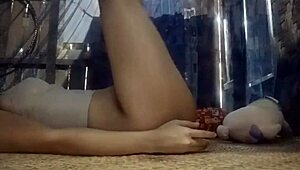 A girl practices yoga before showering in this homemade video.