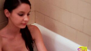 She came in and her sexy lesbian friend called her to join the bath. They licked each other's small tits in the shower.