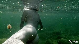 Bold outdoor creampie fuck at the river with Liz and Ted. Public sex in nature.