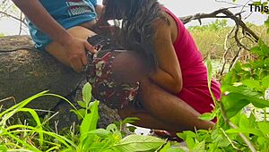 playing with the young girl's ball on the lakeshore