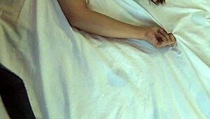 this slutty teen in lingerie sucks balls while masturbating