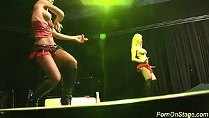 Cock sharing on public sex fair show stage